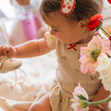 Pointelle Skirt Onesie in Cherries